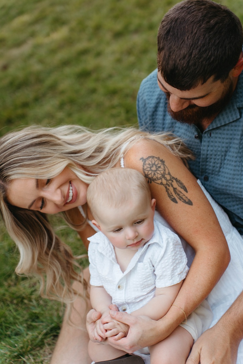 Mother laughing with her baby during a family session