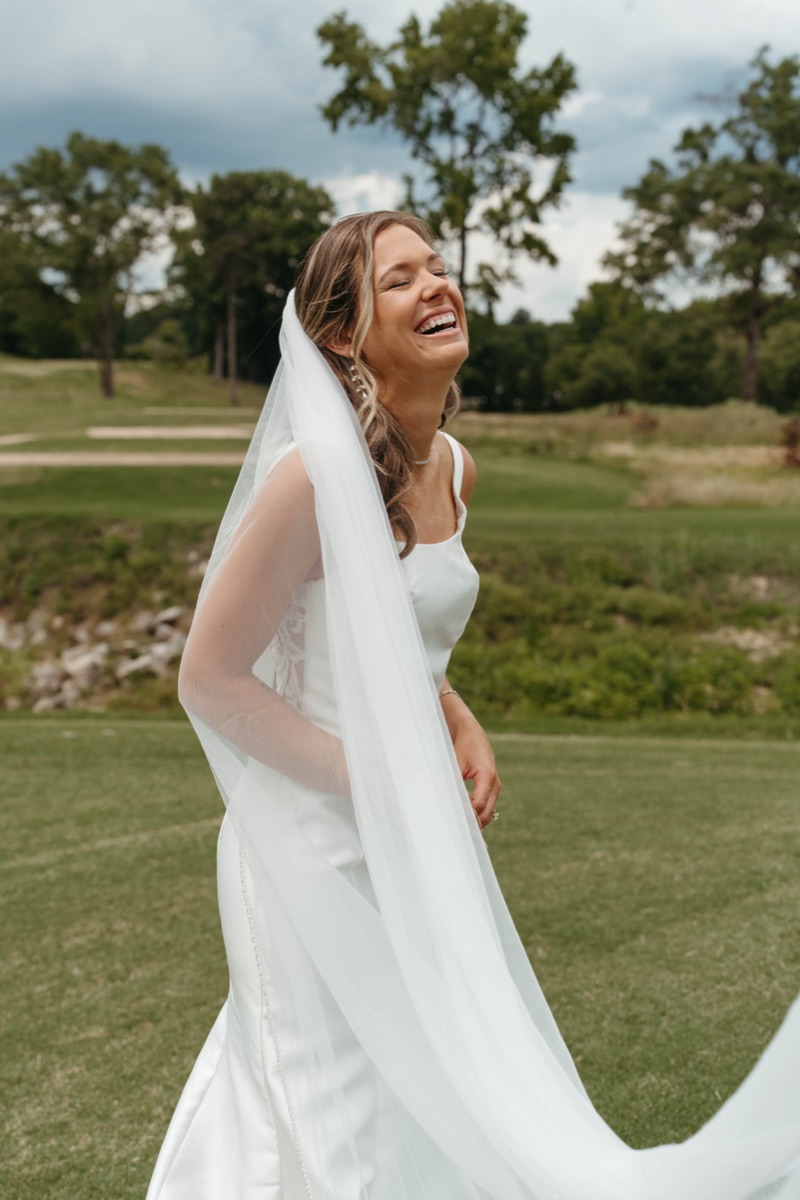 Bride with her veil flowing in the wind